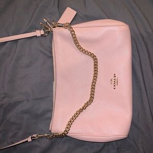 cross body light pink coach purse